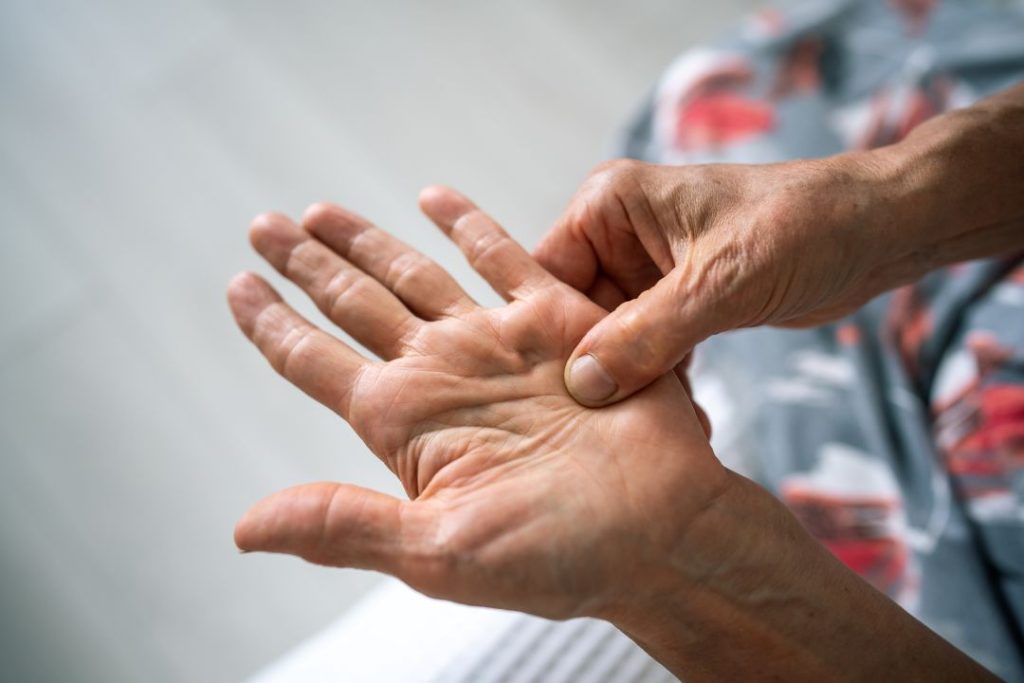 Hand massage therapy for pain relief by chiropractor in Opelika, AL. Relaxation for better health and wellness.