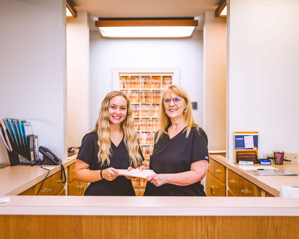Friendly staff at a chiropractor office in Opelika, AL, ready to assist patients with their needs.